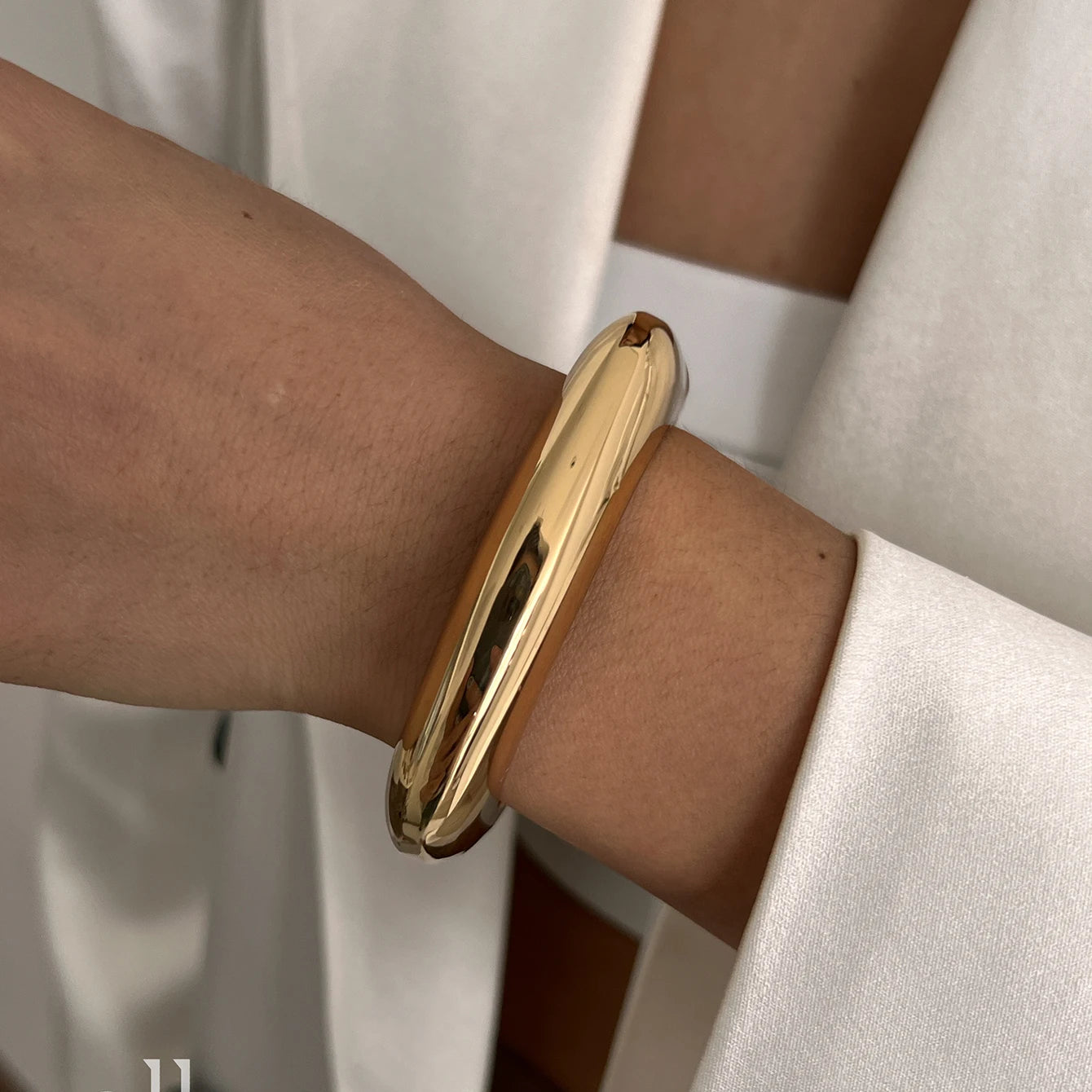 GoldSpiral Luxe Bangle